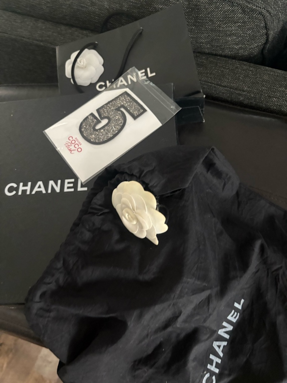 CHANEL Black dust bag Camellia w gift bag& Chanel 5 patch .